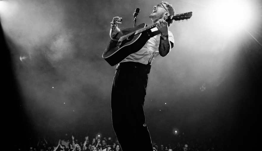 Cian Ducrot on stage black and white