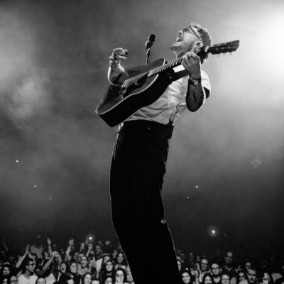 Cian Ducrot on stage black and white