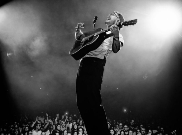 Cian Ducrot on stage black and white