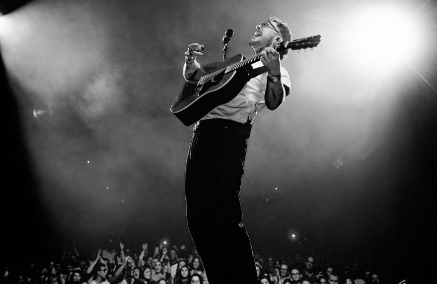 Cian Ducrot on stage black and white