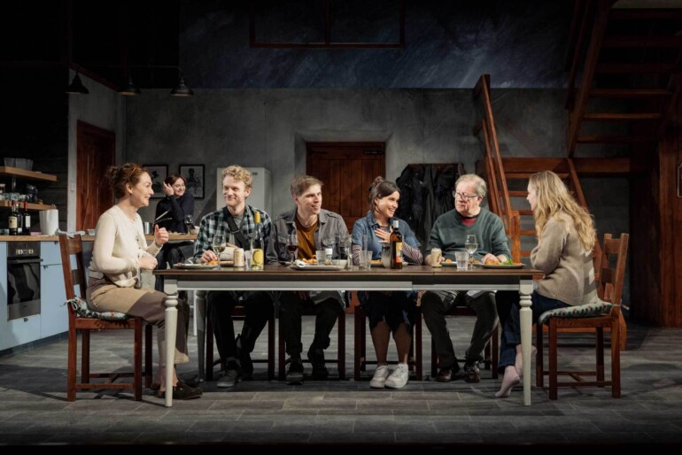 Reunion cast sits at a table