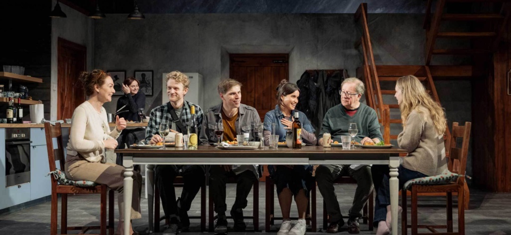 Reunion cast sitting at the dinner table