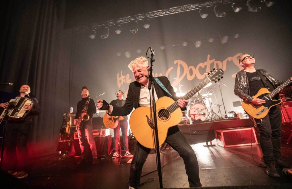 The Saw Doctors performing on stage.