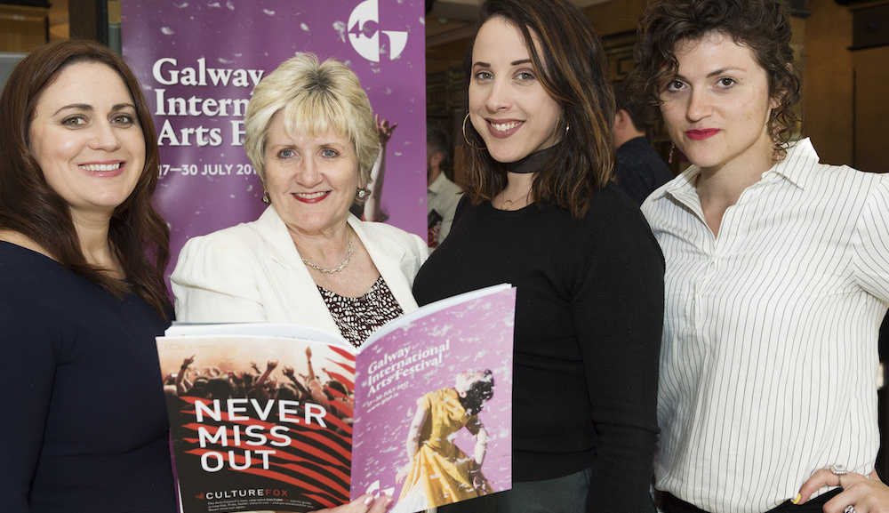 <p>Elizabeth Duffy (centre, in white) at the GIAF 2017 launch with Fundraising Manager Aisling O'Sullivan and former colleagues Ciara O'Reilly and Kady Perry.</p>