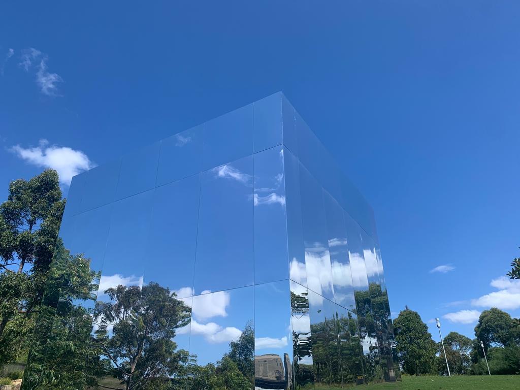 Mirrored panels of Mirror Pavilion reflect the sky in Sydney, Australia
